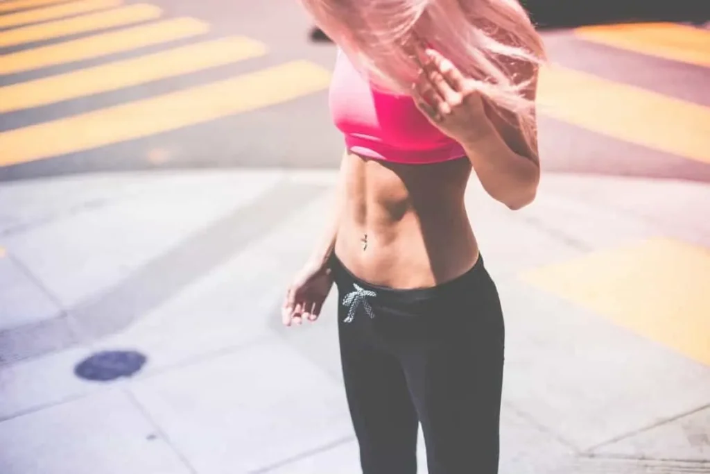 Woman with toned stomach after LA-EMS Body Sculpting Treatment SCOTLAND